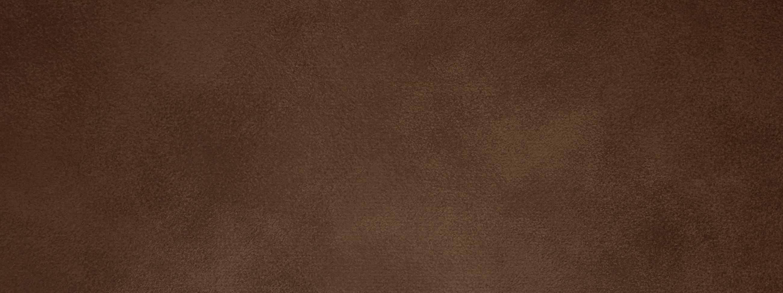 Brown textured surface background.