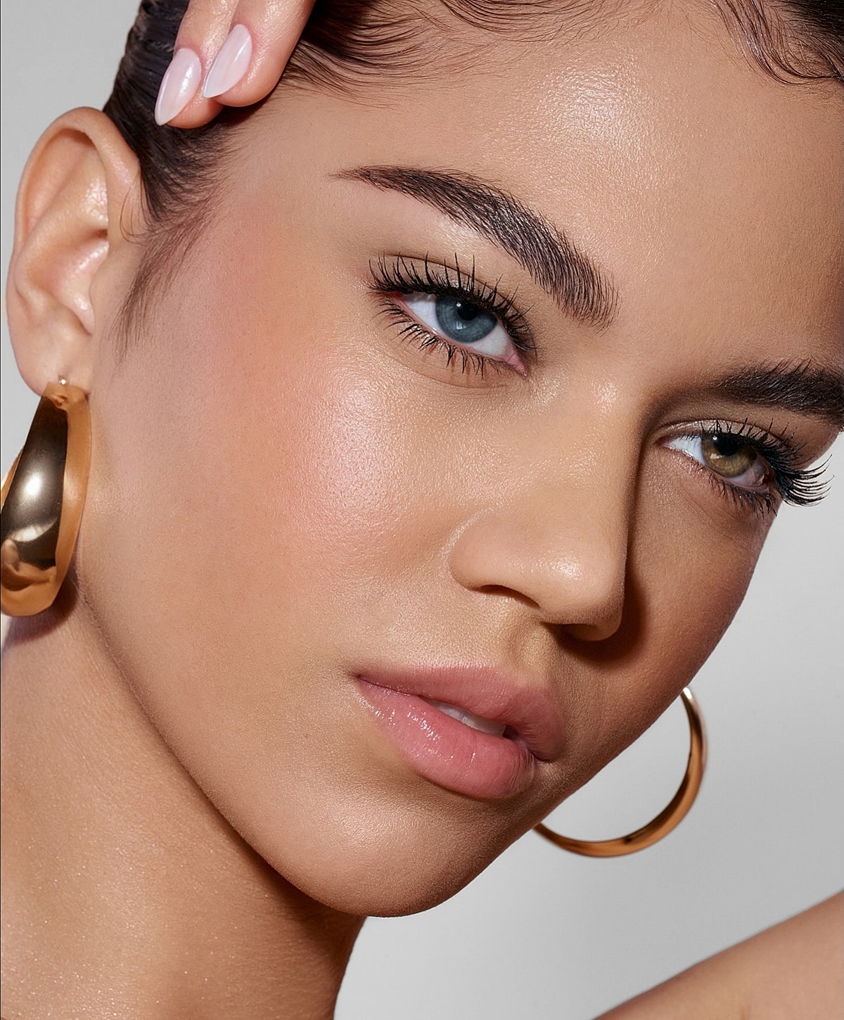 Close-up of a woman with striking eyes.